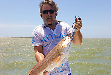 https://www.texasguidefishing.com/wp-content/uploads/2019/07/Jack-7-13-34-inch-redfish-tmb.jpg